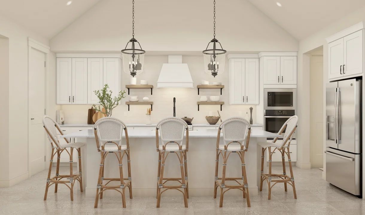 Kitchen with sloped ceiling and pendant lighting