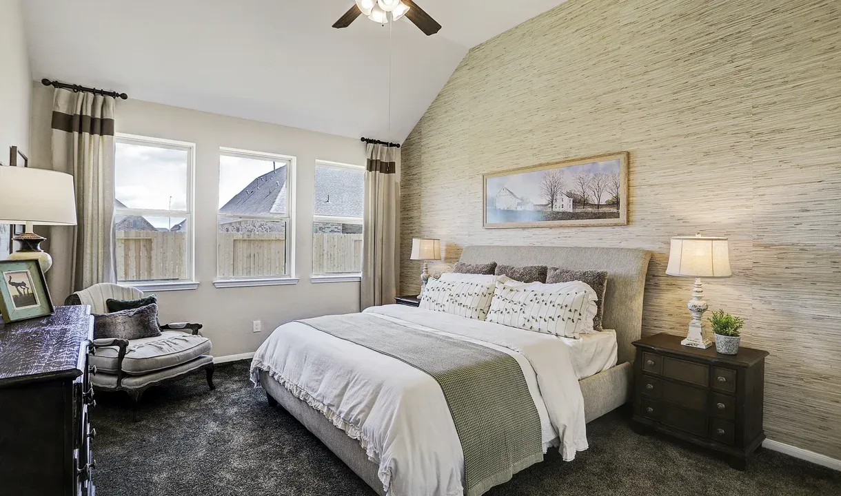 Owner's suite with sloped ceiling