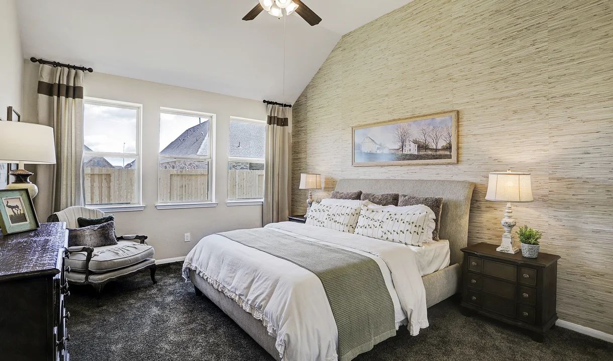 Owner's suite with sloped ceiling