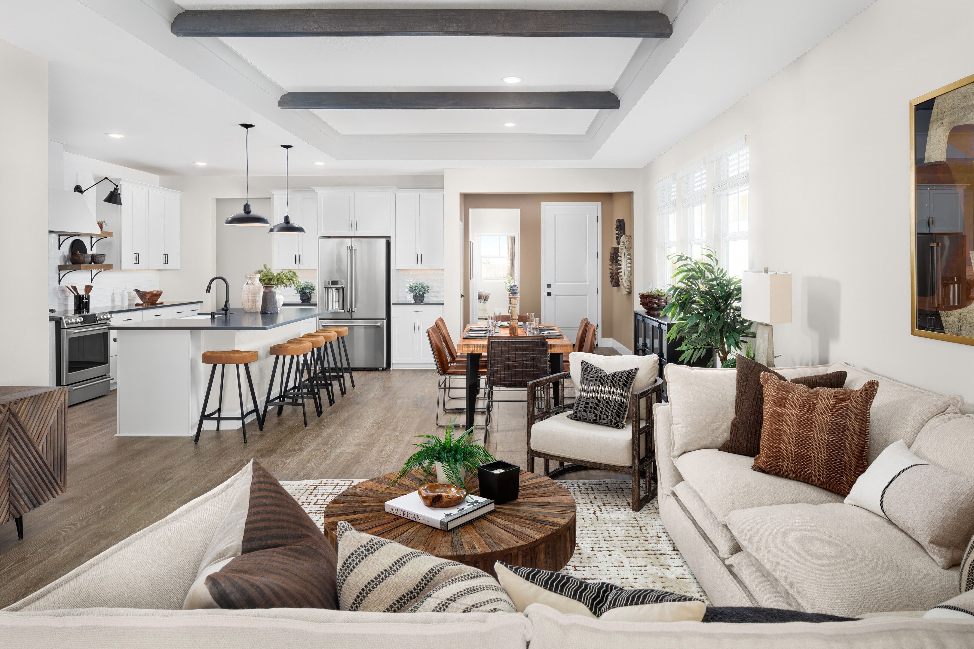 Great room with stained ceiling beams