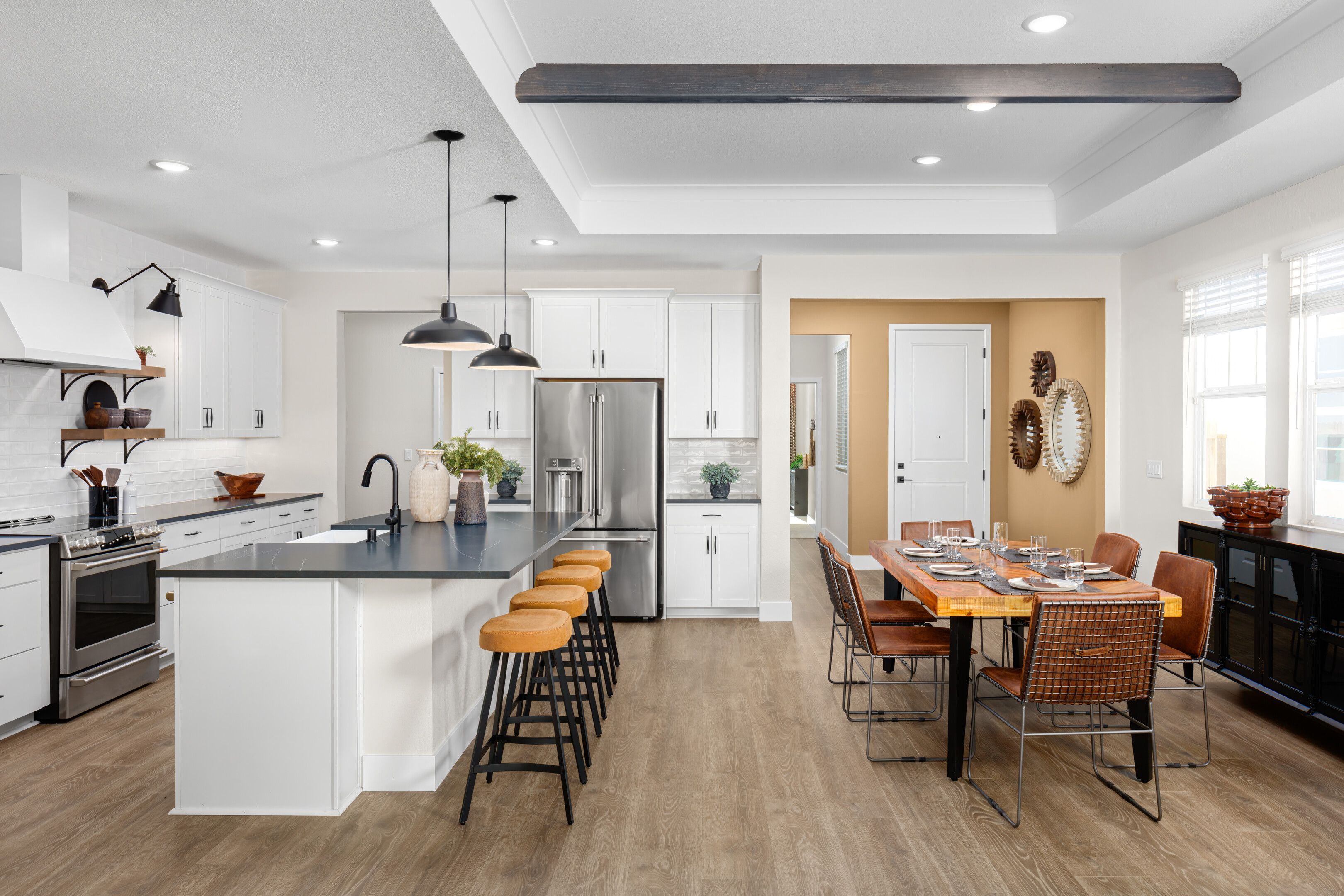 Kitchen and dining area with luxurious wood flooring