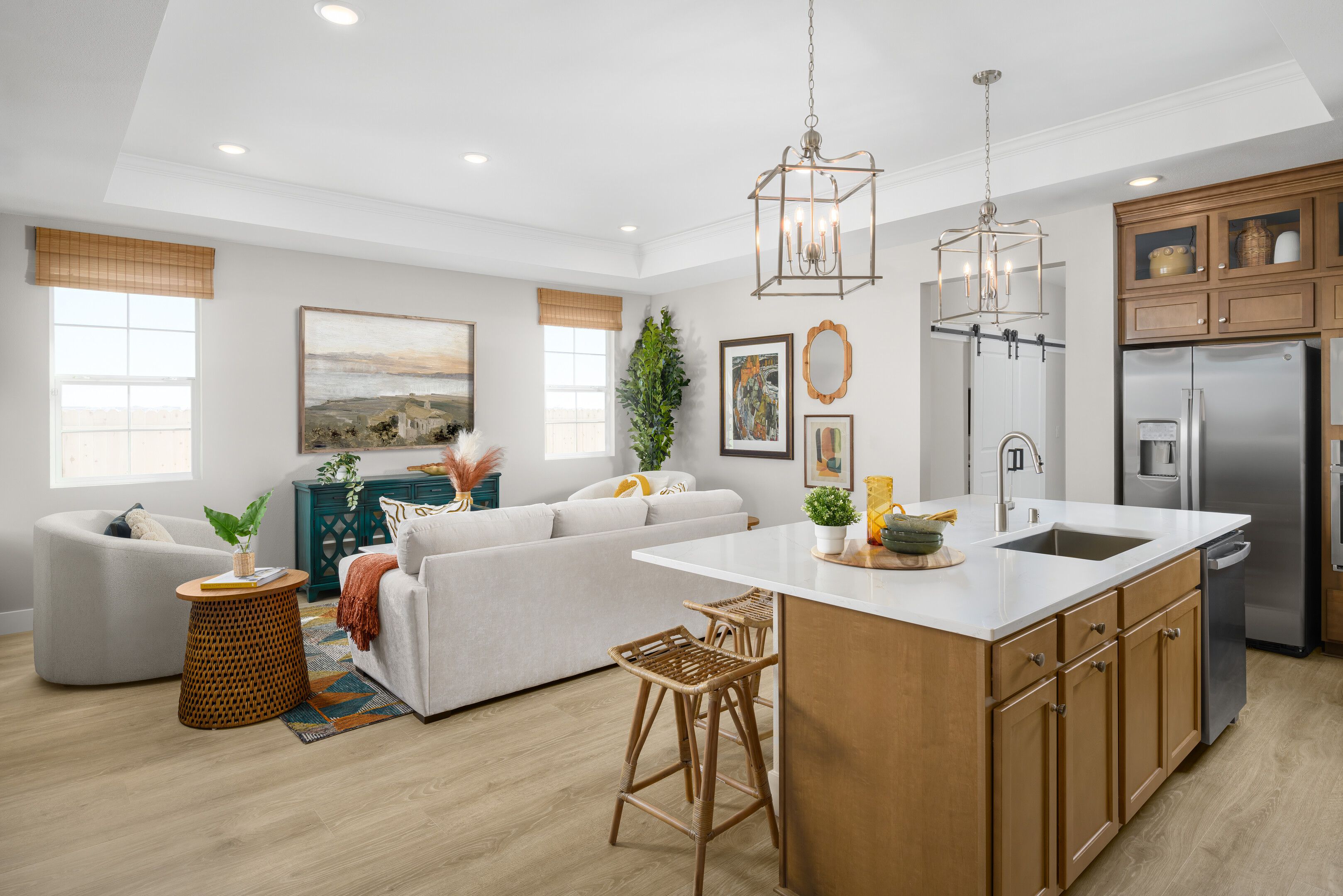 Great room with gorgeous flooring and pendant lighting