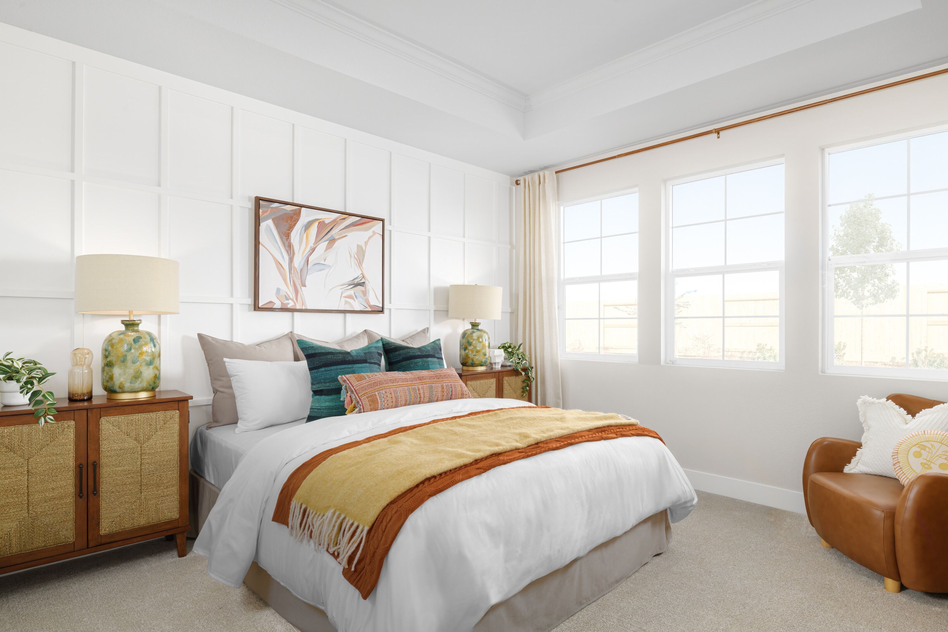 Primary suite with decorative feature wall