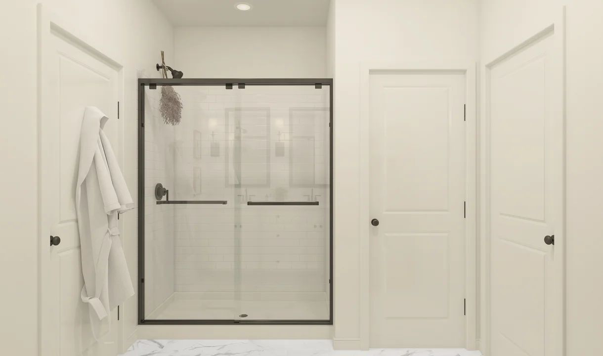 Primary bath with glass shower enclosure