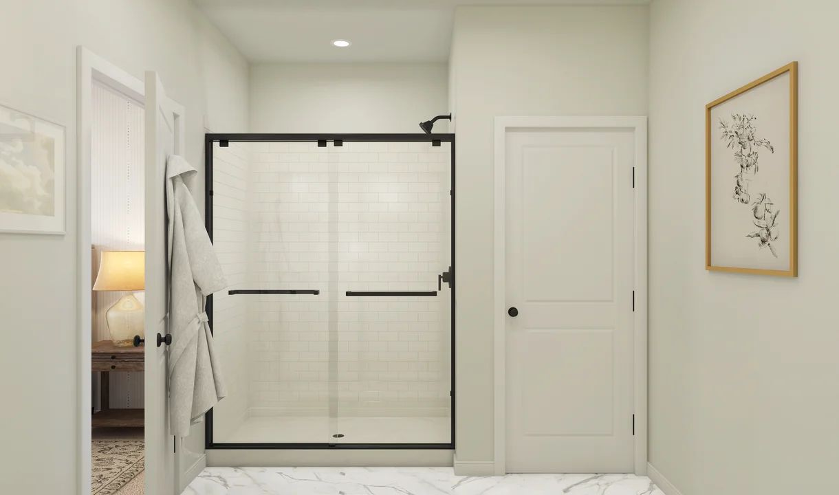Primary bath with glass shower enclosure