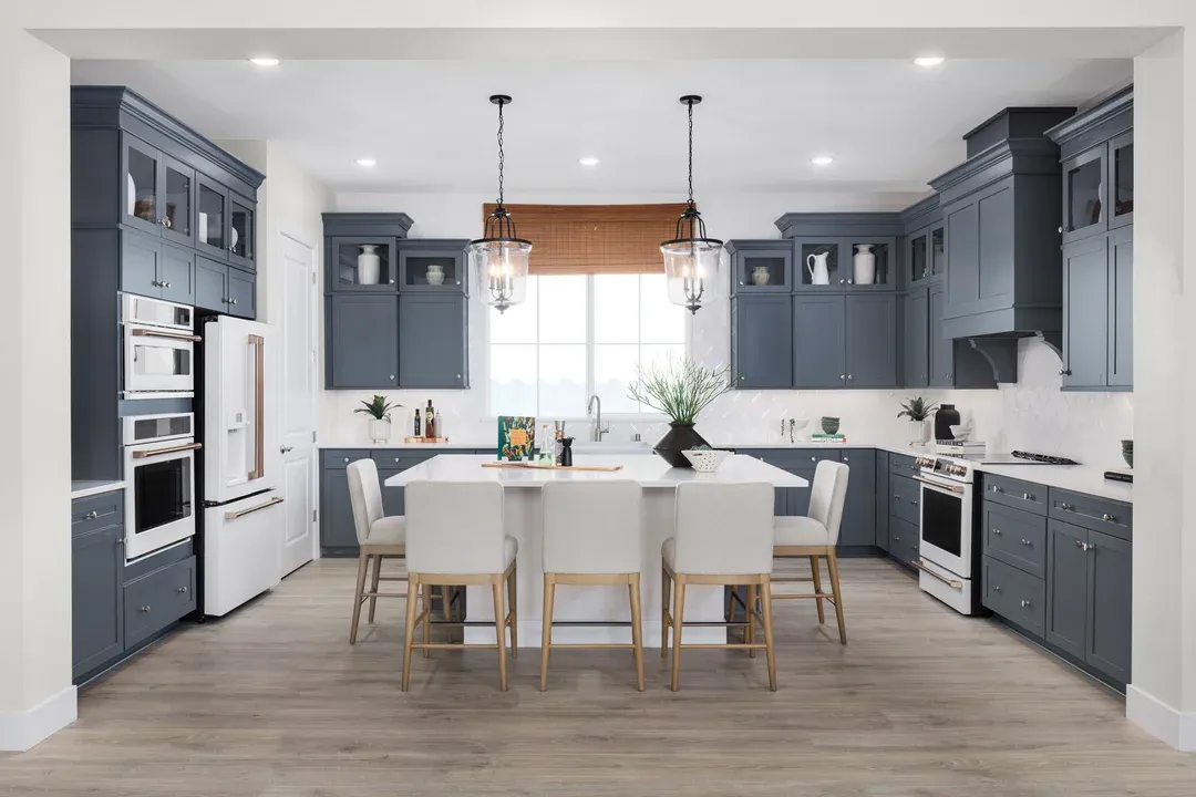 Glass upper cabinets and gorgeous flooring in kitchen