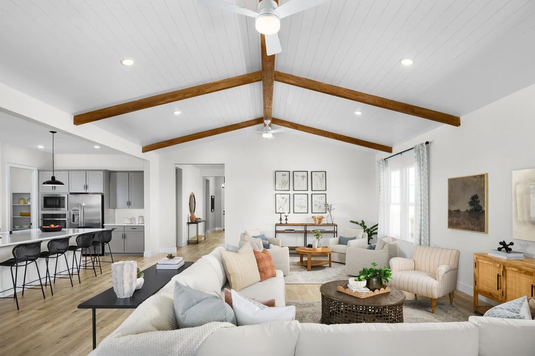 Great room with vaulted ceiling and shiplap
