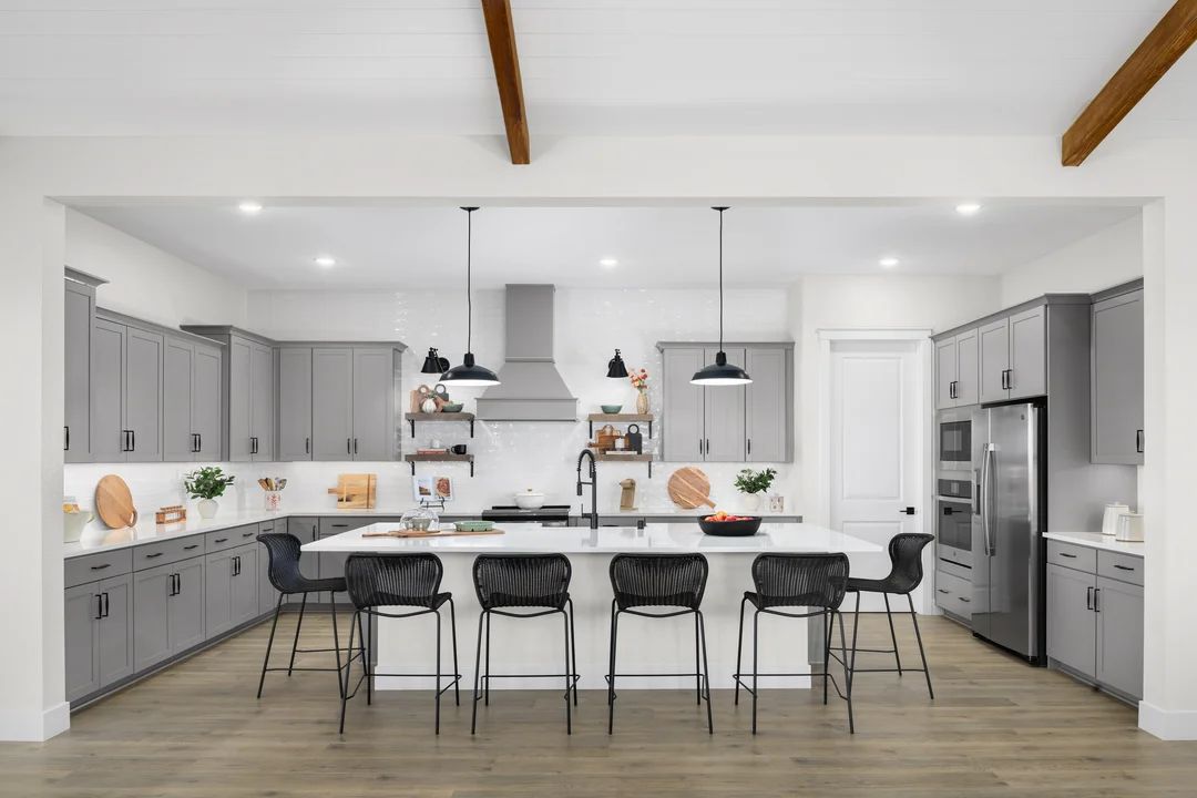 Kitchen with pendant lighting and subway tile backsplash