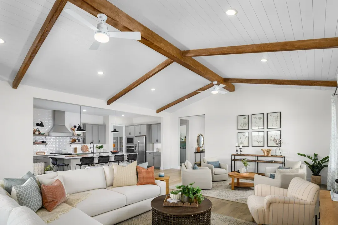 Great room with vaulted ceiling and stained ceiling beams