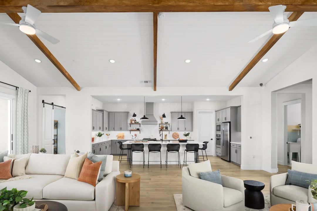 Great room with vaulted ceiling and stained ceiling beams