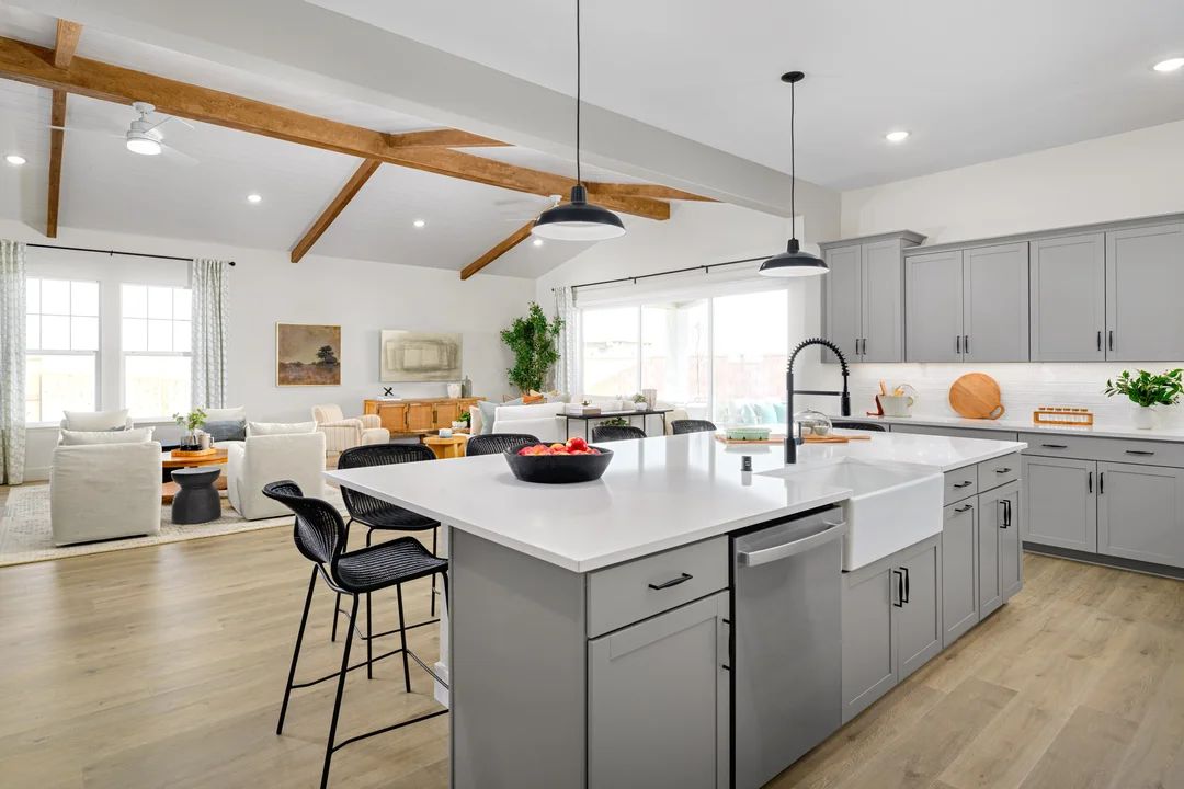 Kitchen with spacious island and white apron-front sink