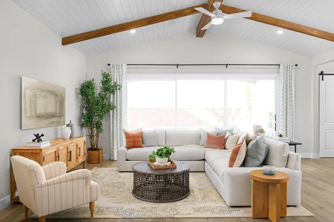Great room with vaulted ceiling and stained ceiling beams