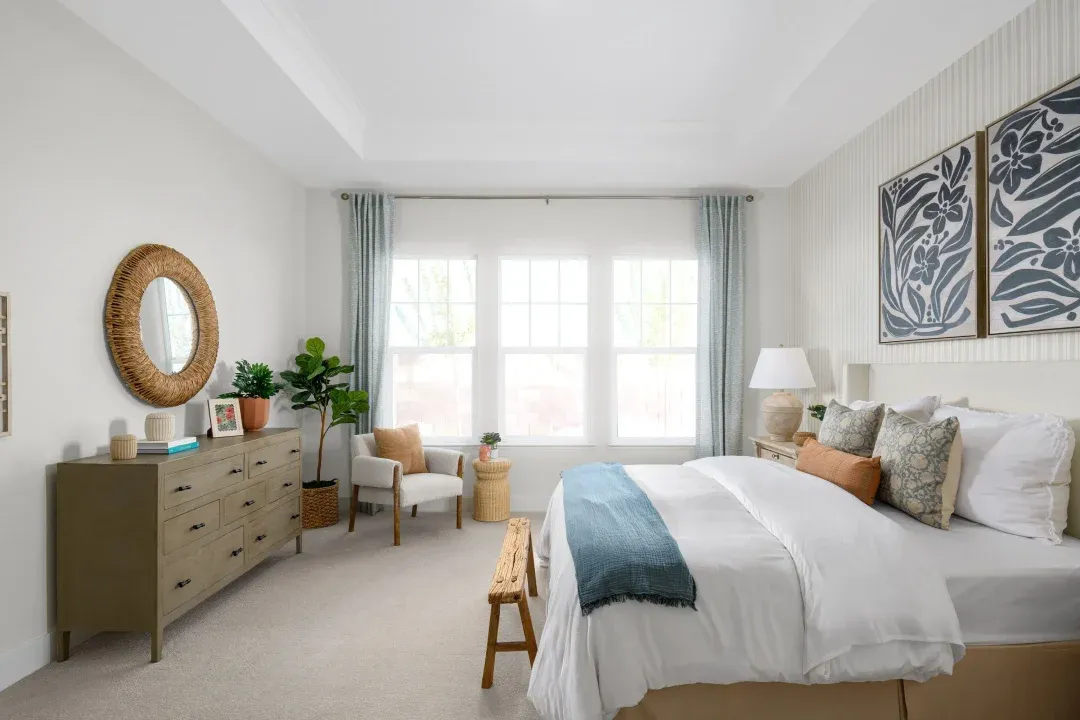 Primary suite with tray ceiling and crown moulding