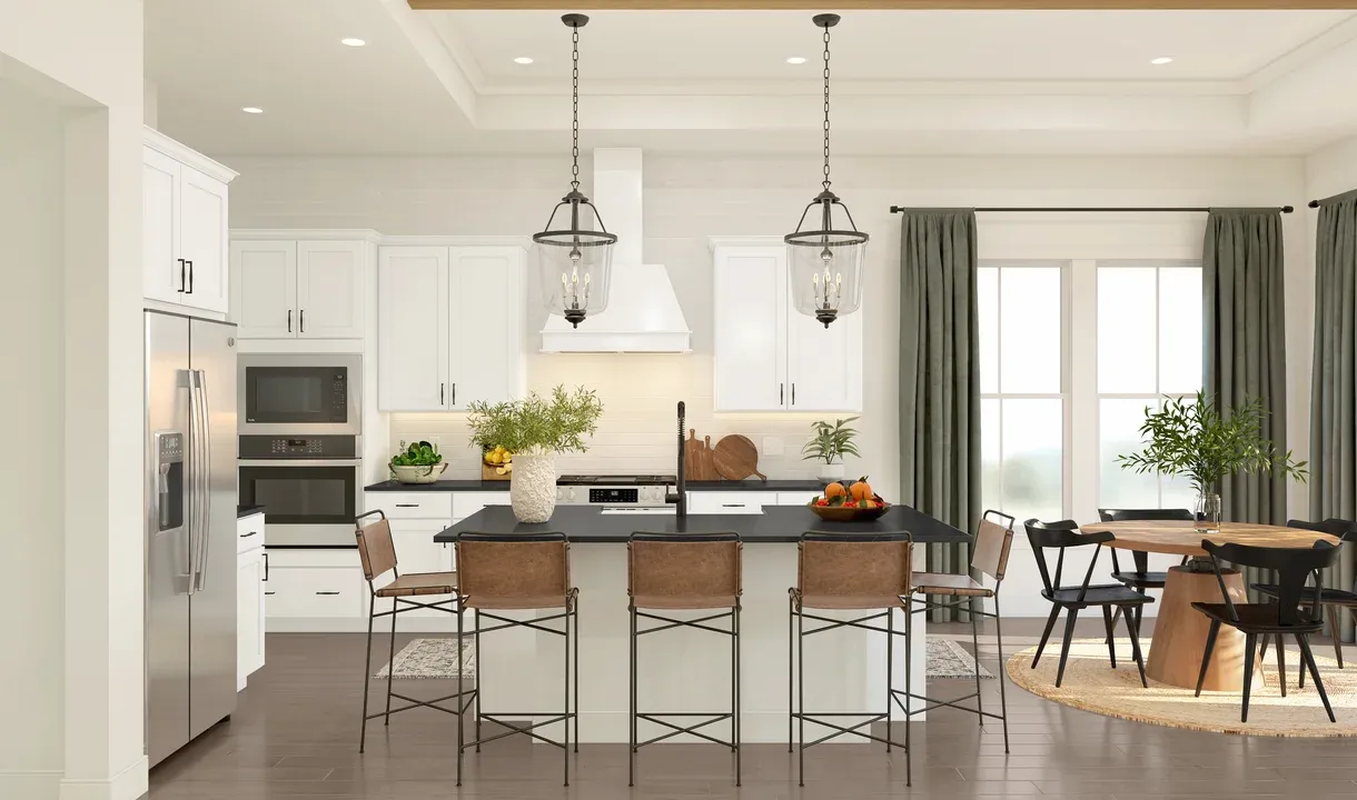 Kitchen with white cabinets & pendant lights