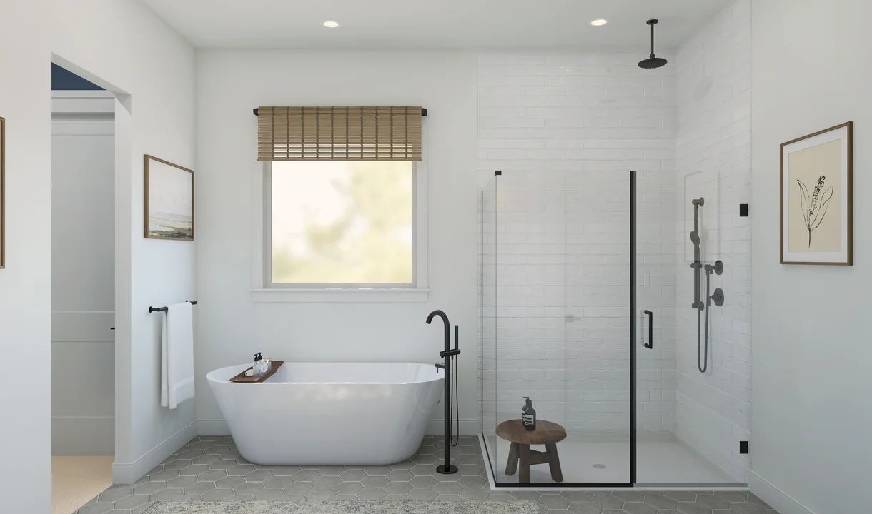 Primary bath with freestanding tub & glass-shower enclosure