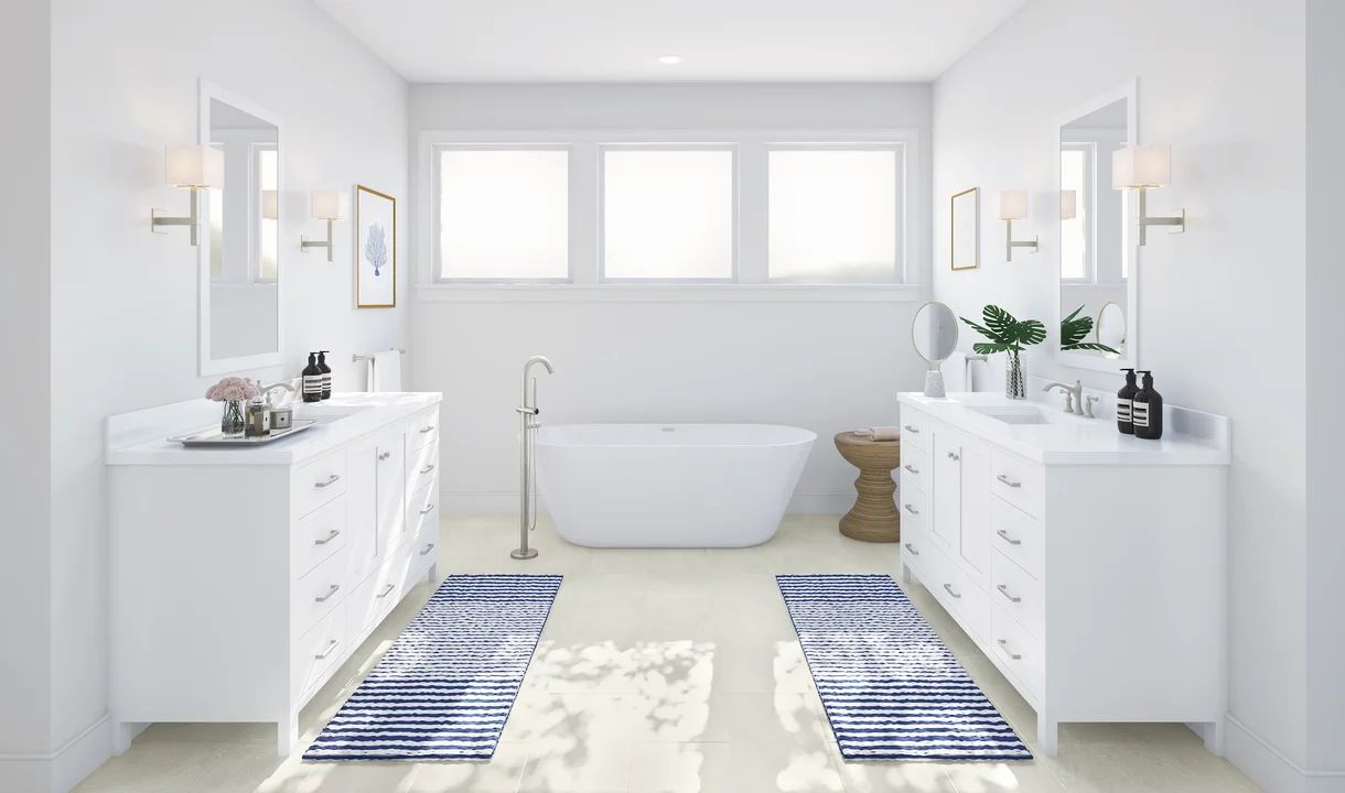 Primary bath with freestanding vanities & tub