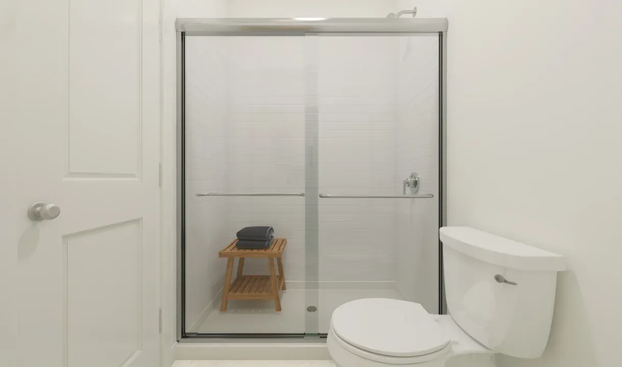 Primary bath with glass shower enclosure