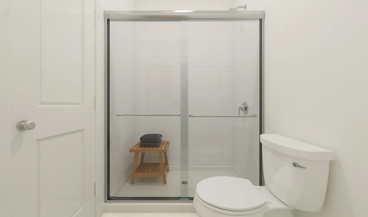 Primary bath with glass shower enclosure