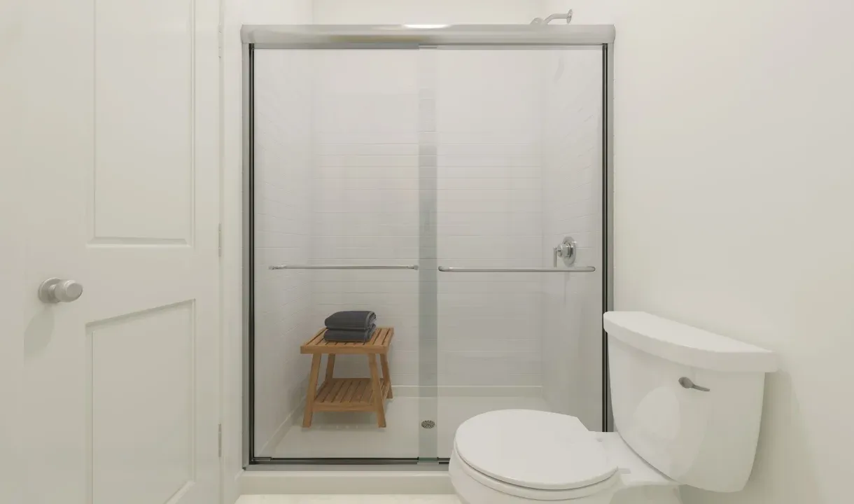 Primary bath with glass shower enclosure