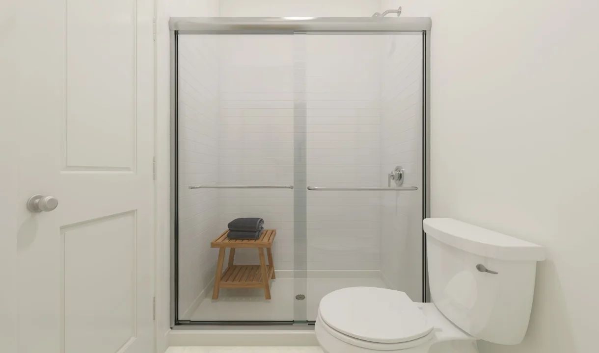 Primary bath with glass shower enclosure