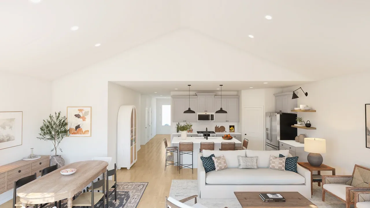 Open concept living spaces with vaulted ceiling