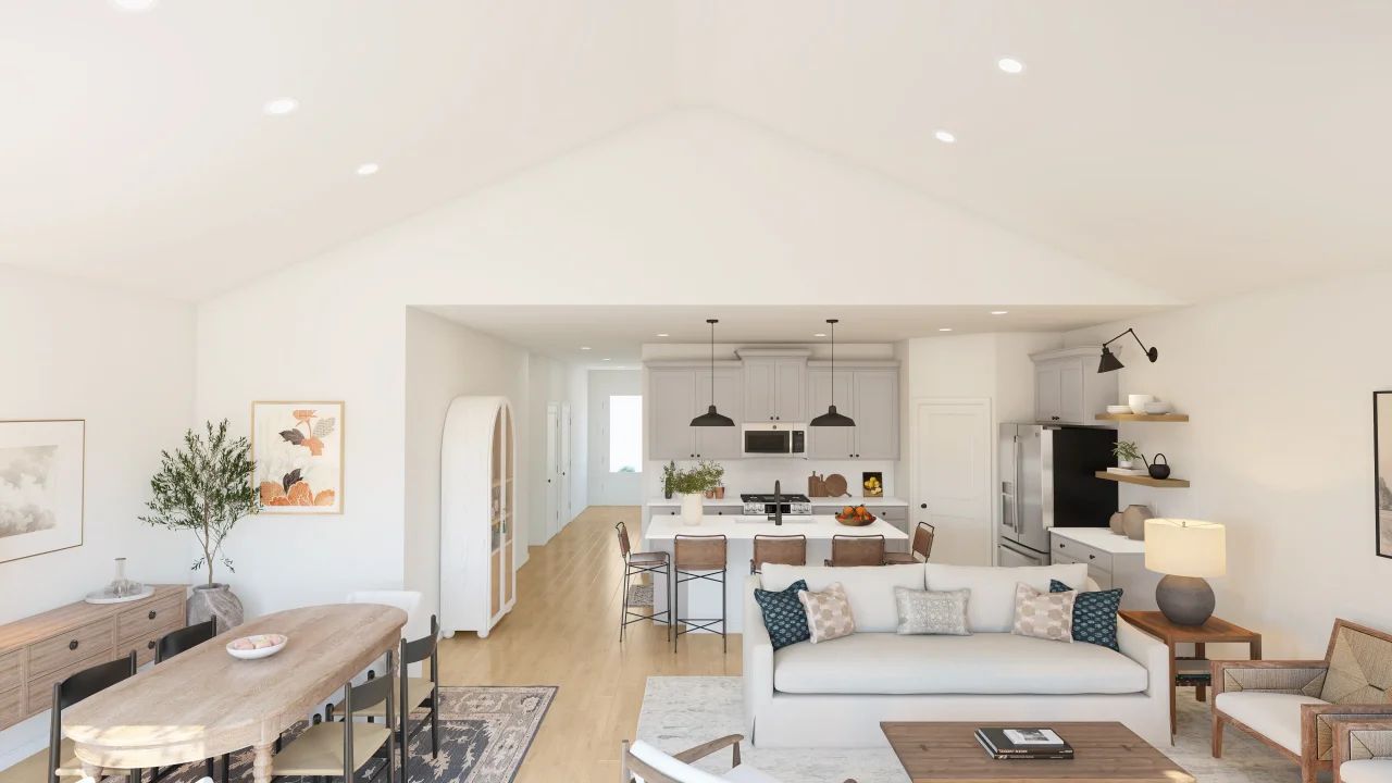 Great room & dining area with vaulted ceiling