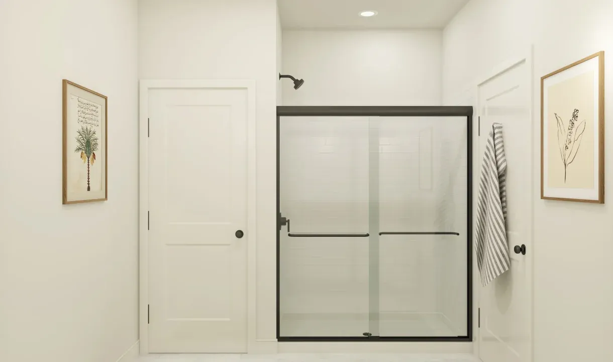 Primary bath with glass shower enclosure
