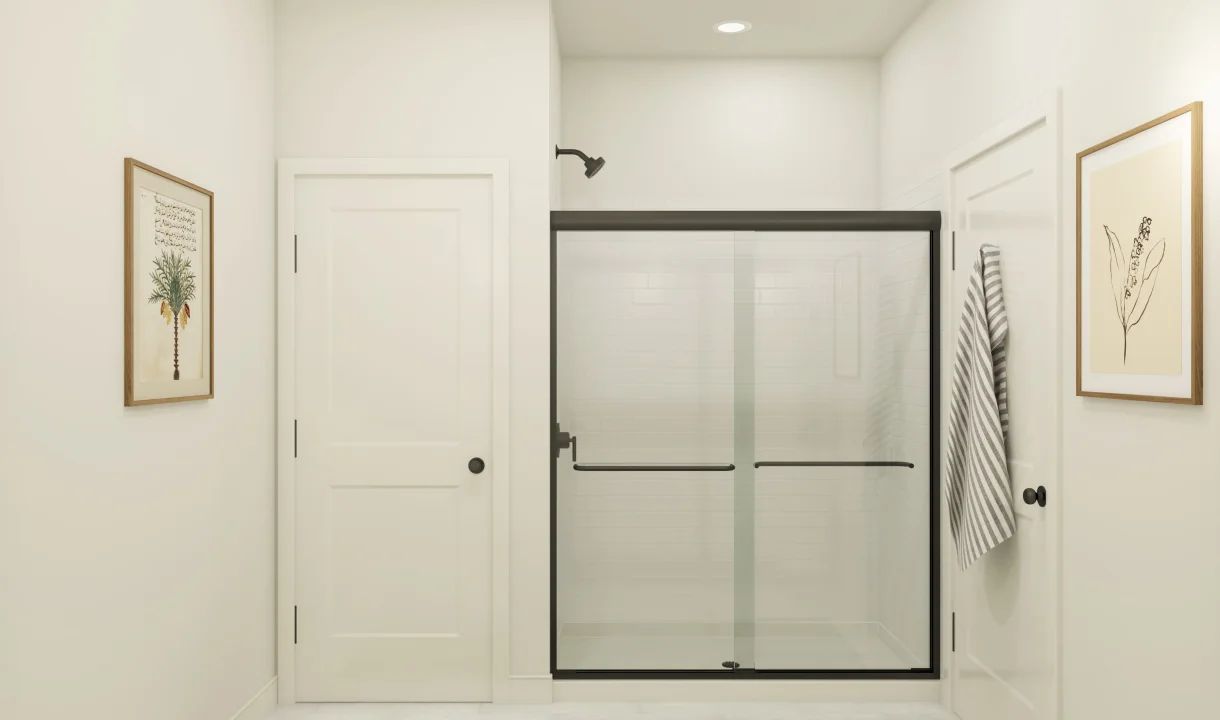 Primary bath with glass shower enclosure