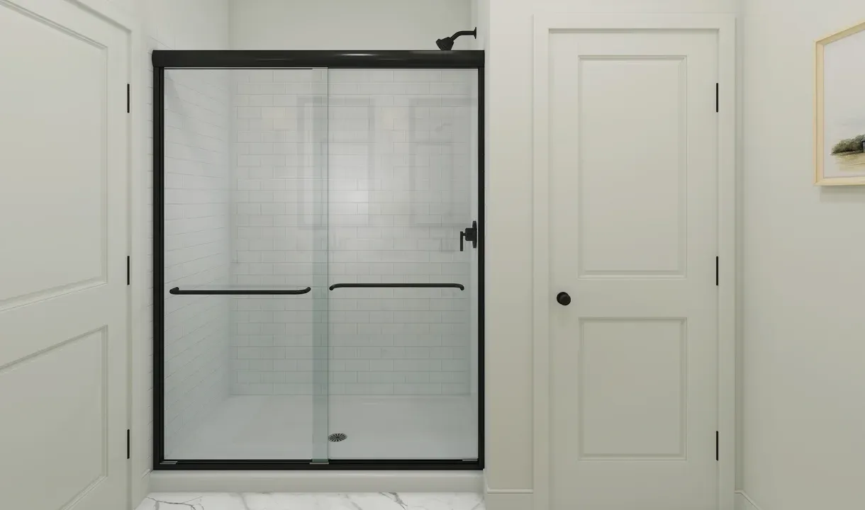 Primary bath with glass shower enclosure