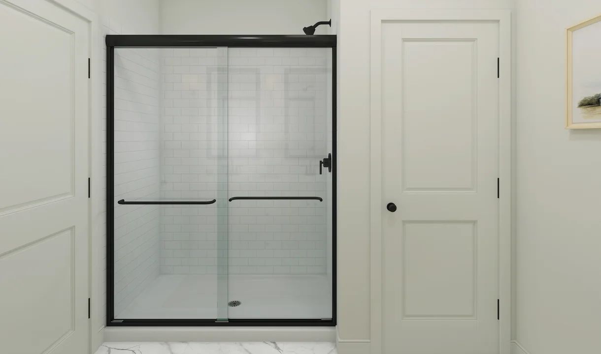 Primary bath with glass shower enclosure