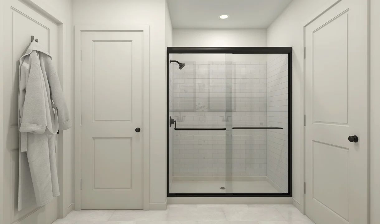 Primary bath with glass shower enclosure