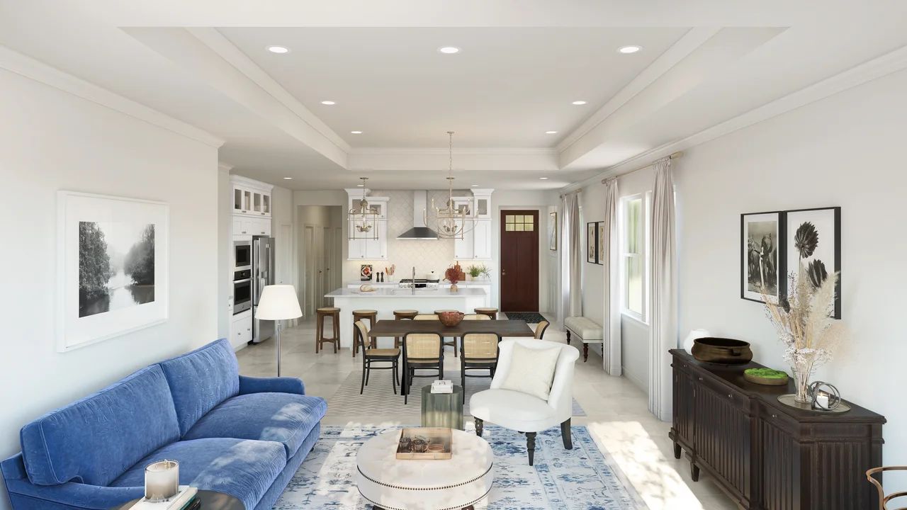Great room with crown moulding and tray ceiling