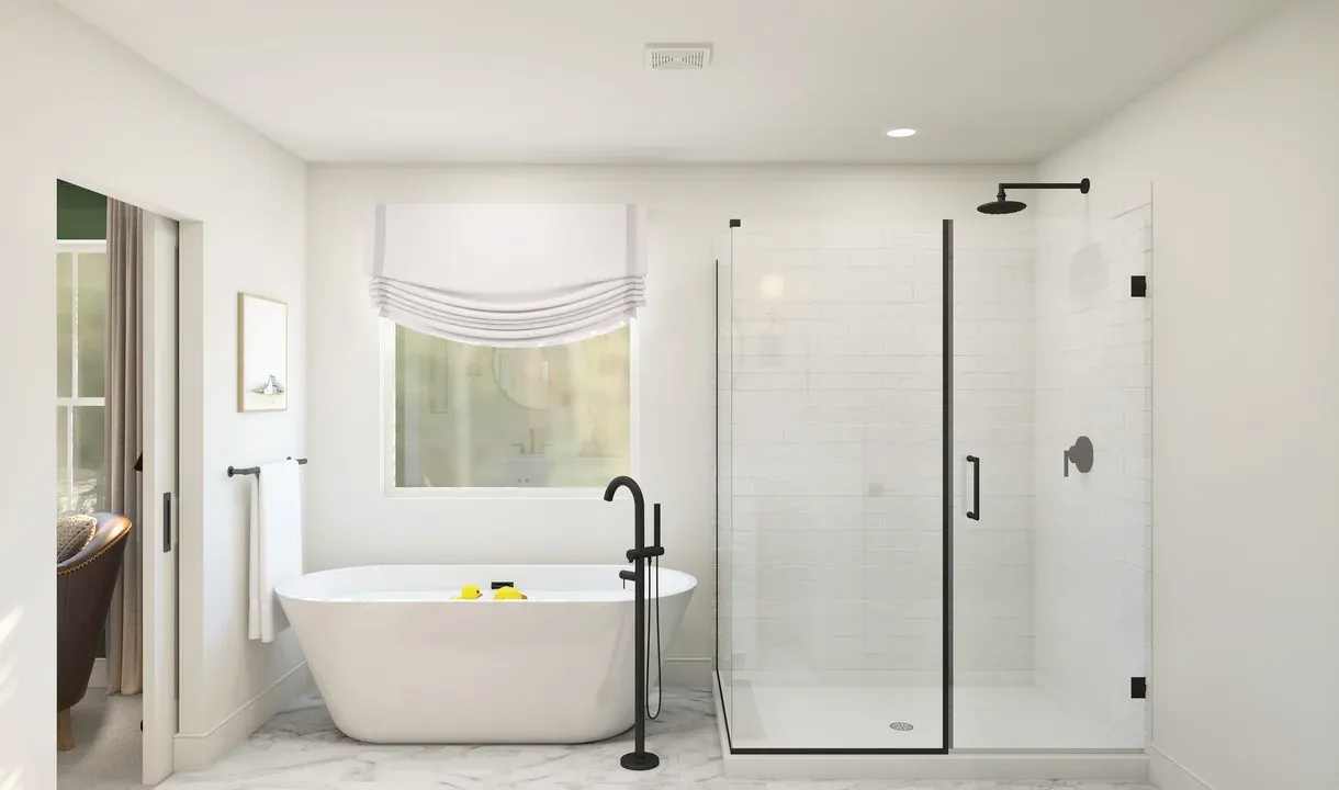 Primary bath with freestanding tub & glass-shower enclosure