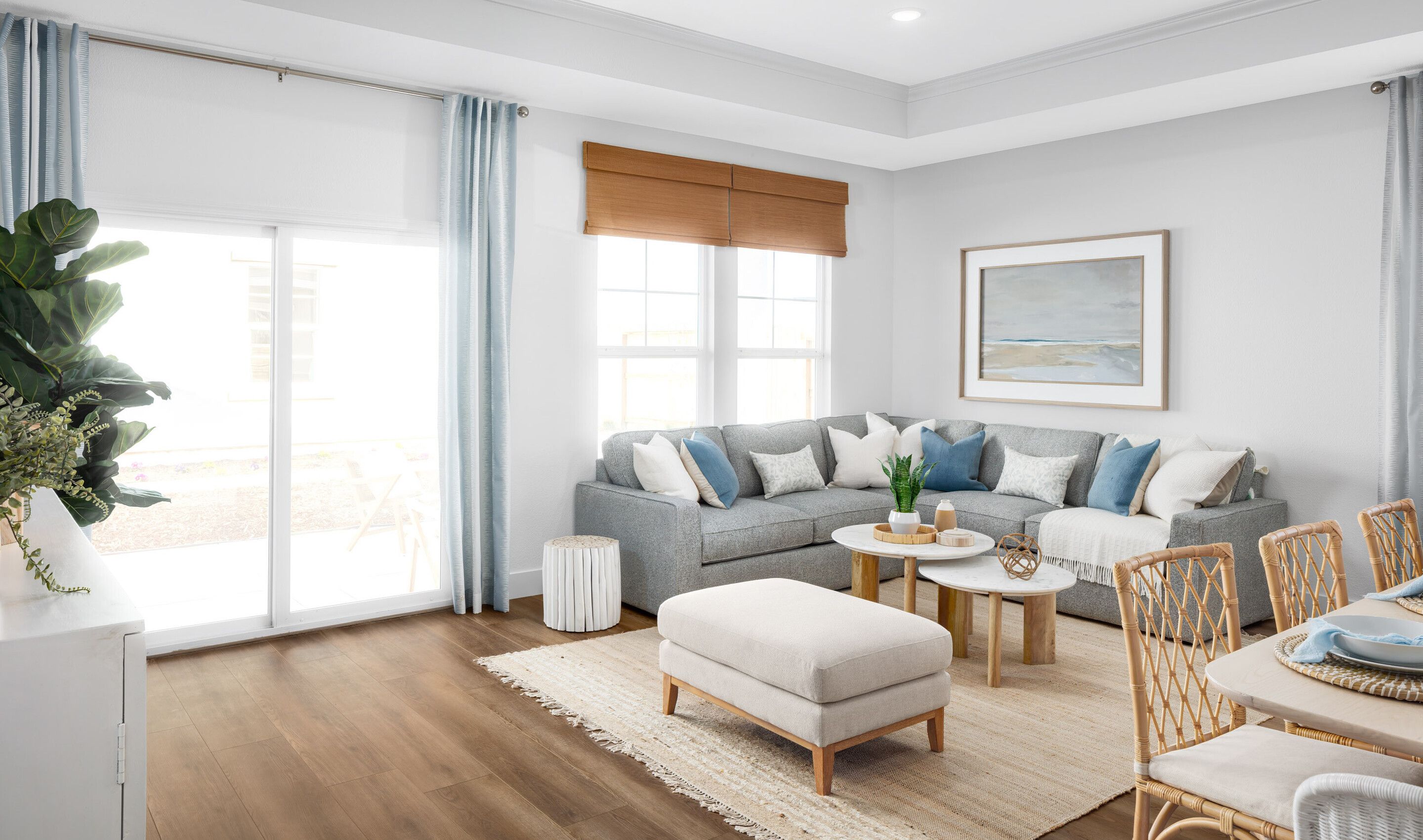 Great room with coffered ceiling and crown moulding