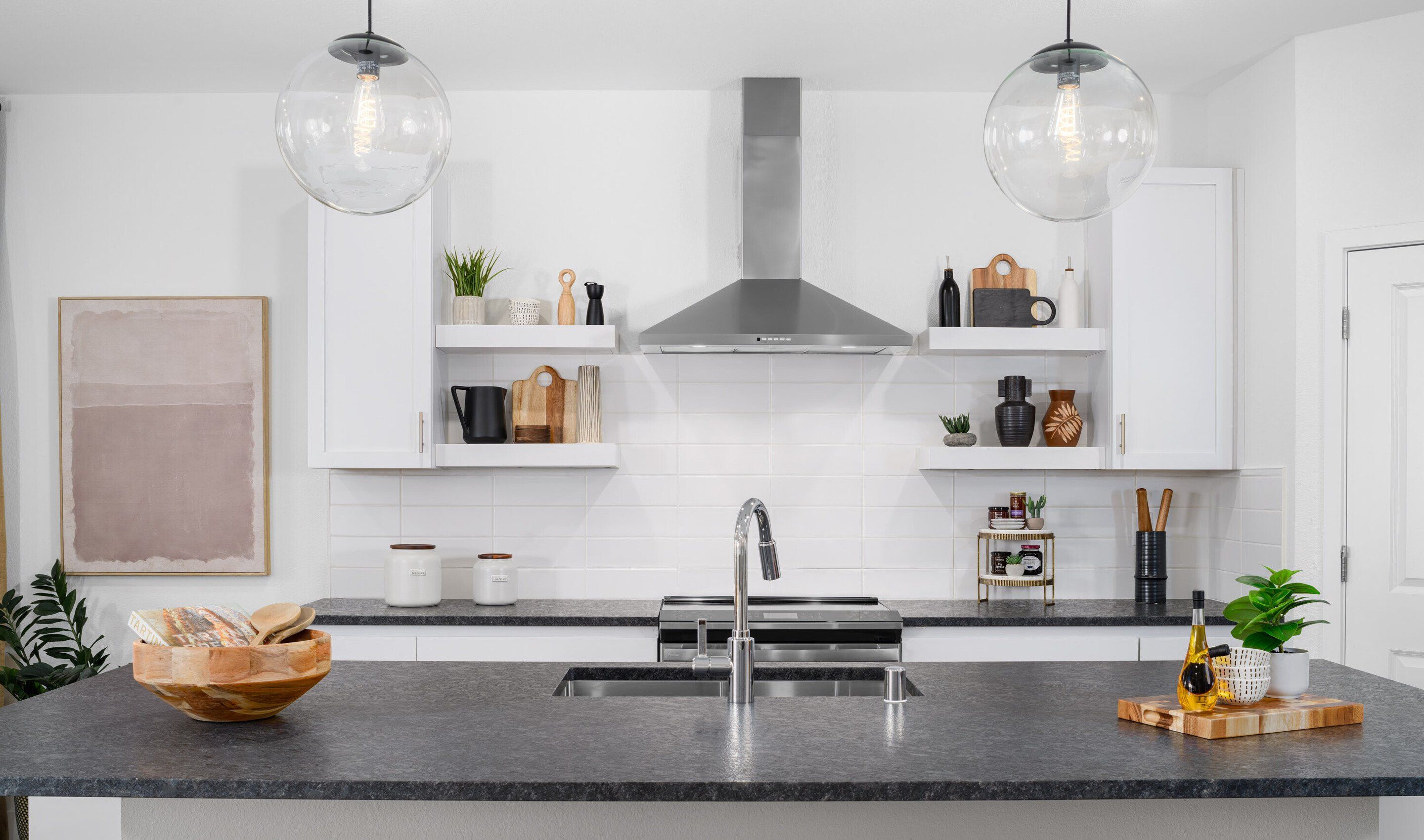 Floating shelves and subway tile backsplash