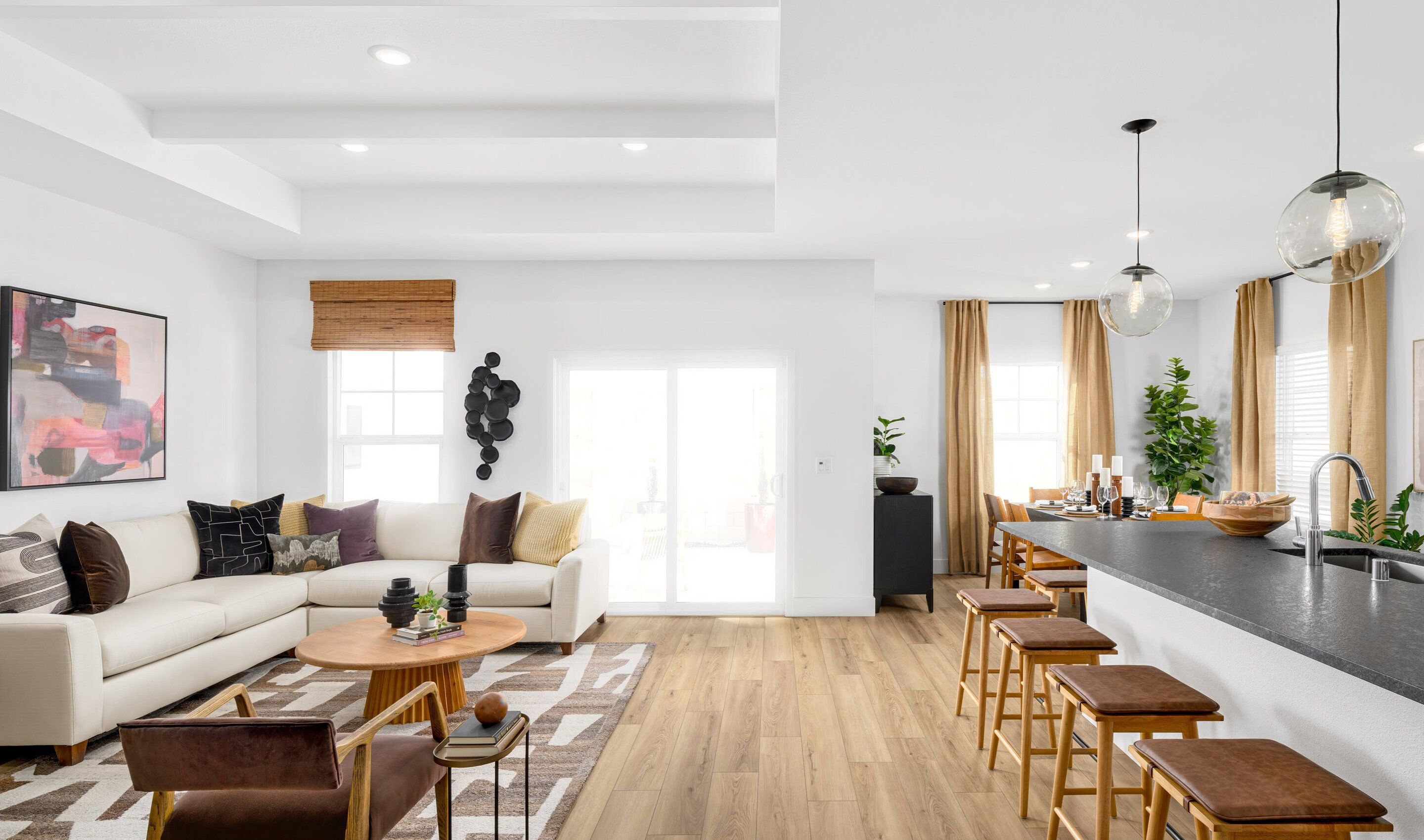 Great room and kitchen with luxurious wood flooring