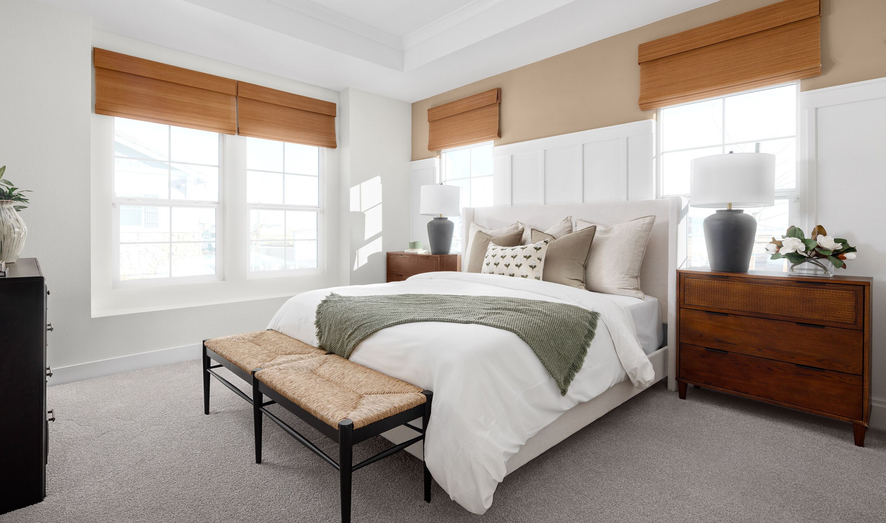 Primary suite with decorative feature wall