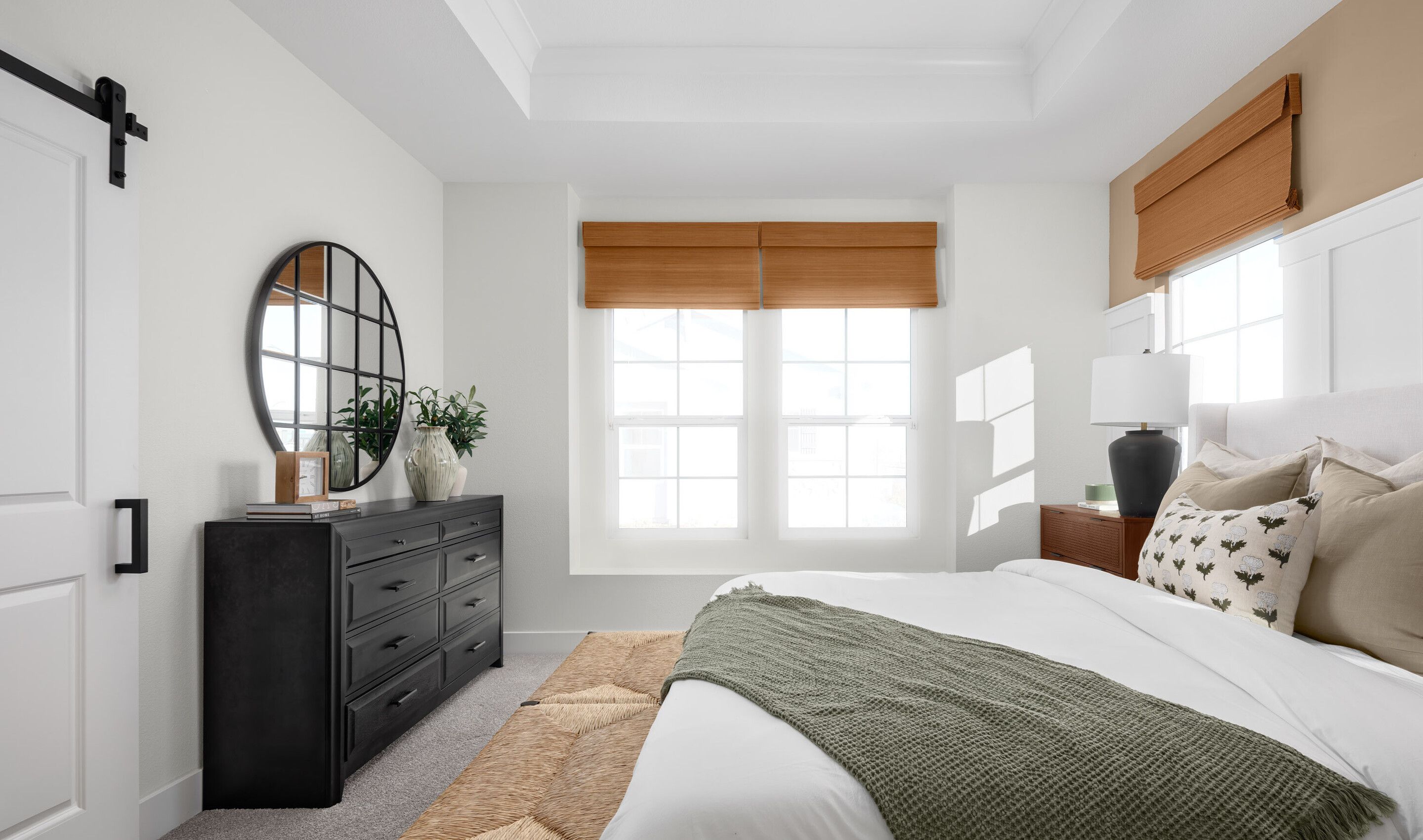 Primary suite with barn door to primary bath