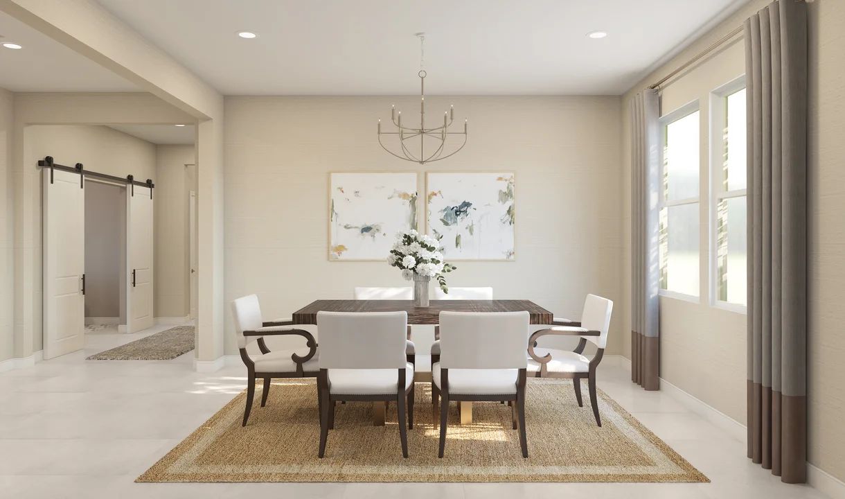 Dining room with chandelier off the extended foyer