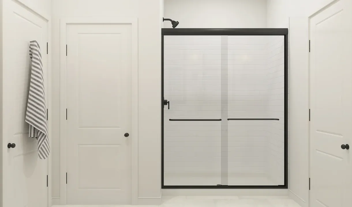 Primary bath with glass shower enclosure