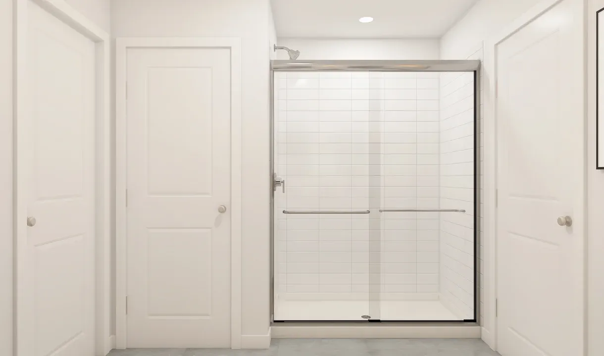 Primary bath with glass shower enclosure