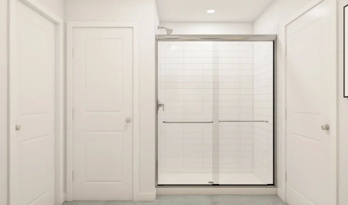 Primary bath with glass shower enclosure