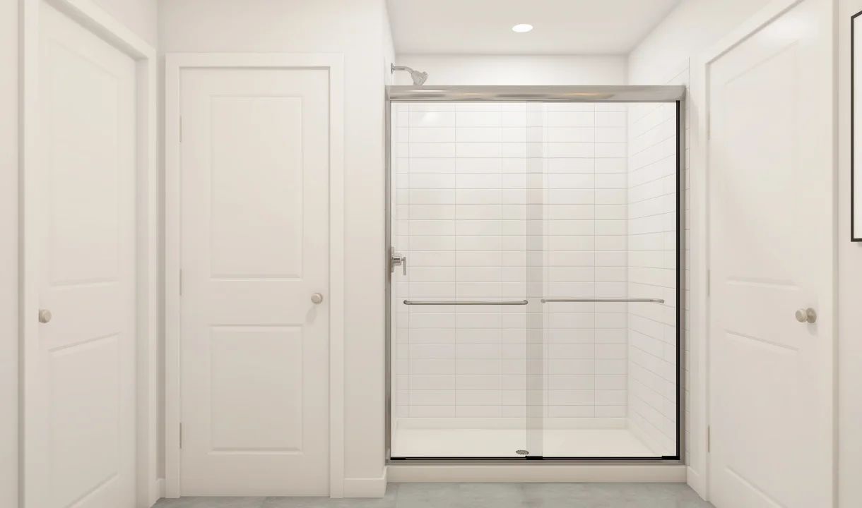 Primary bath with glass shower enclosure