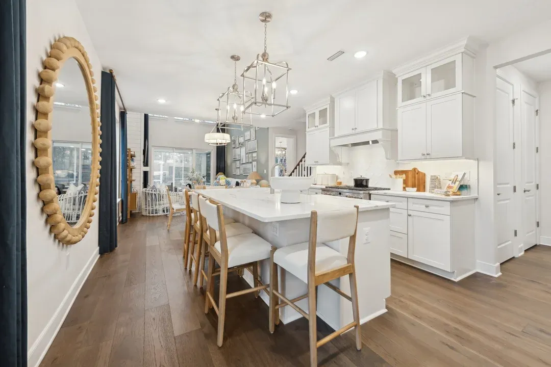 Kitchen with upper glass white cabinetry