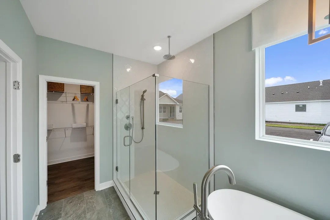 Primary bath with glass shower enclosure
