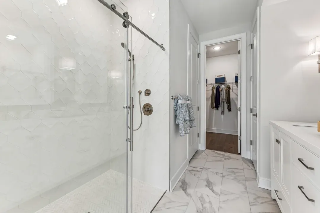 Primary bath with glass shower enclosure