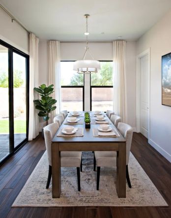 Dining area with chandelier and sliding glass door to covered patio