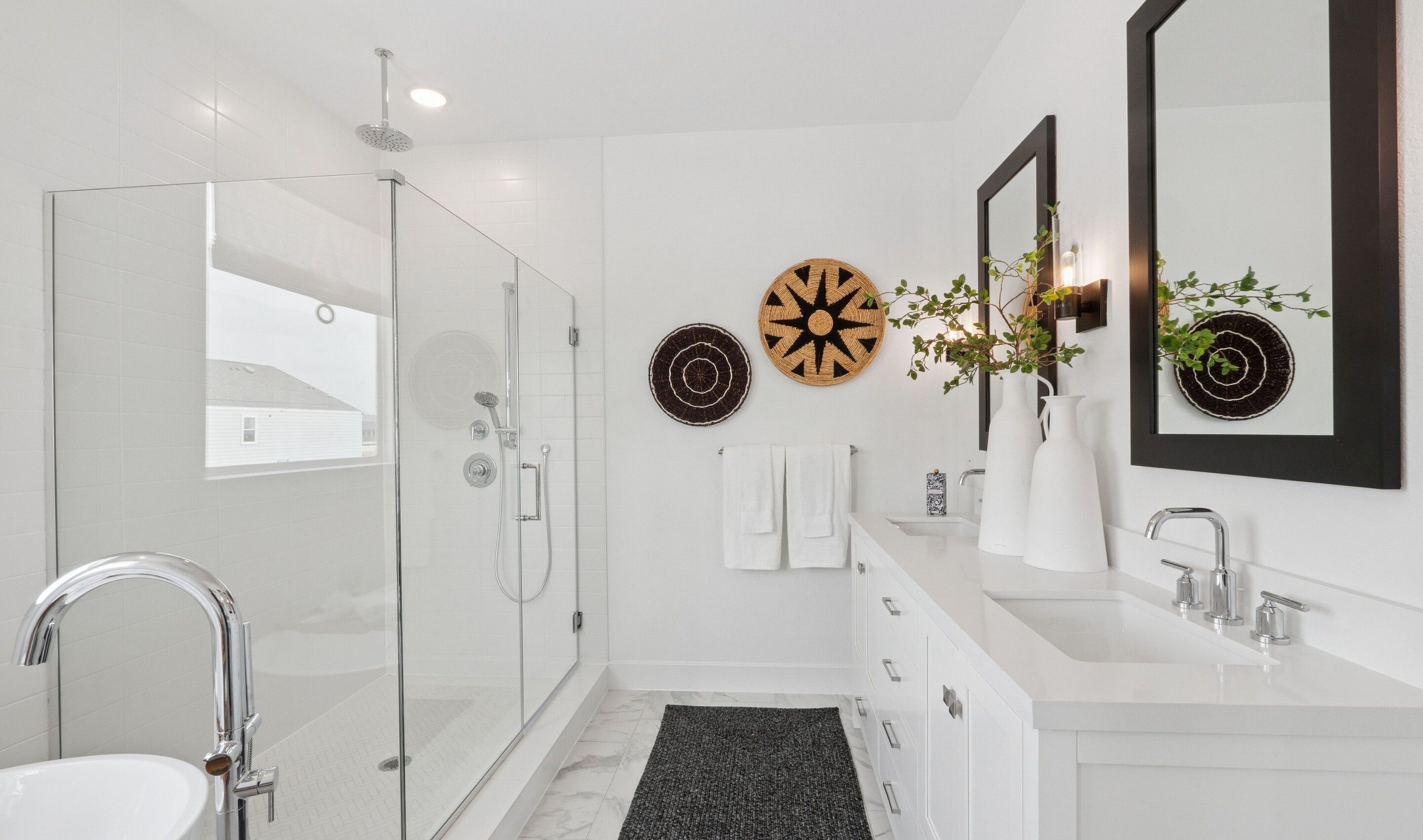 Primary bath with glass shower enclosure & chrome hardware
