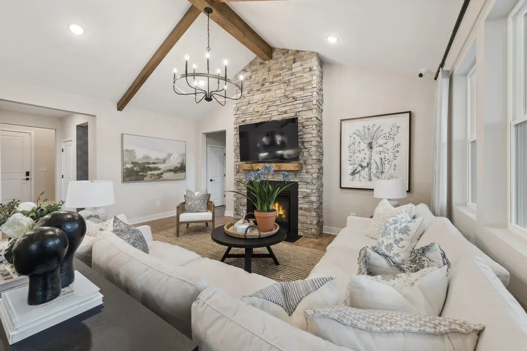 Great room with vaulted ceiling and stained ceiling beams