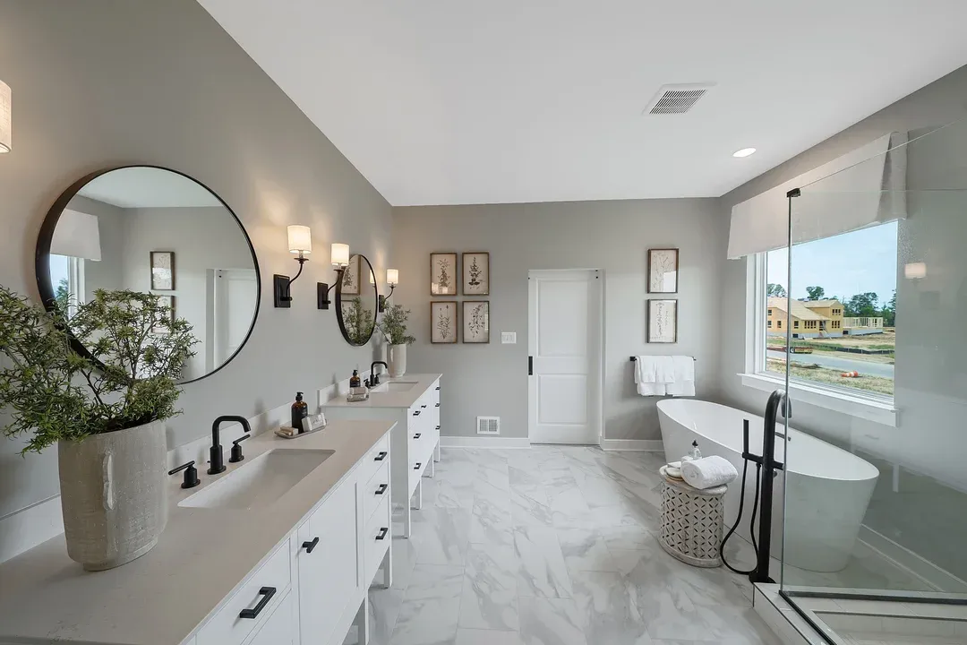 Primary bath with freestanding tub and dual sinks